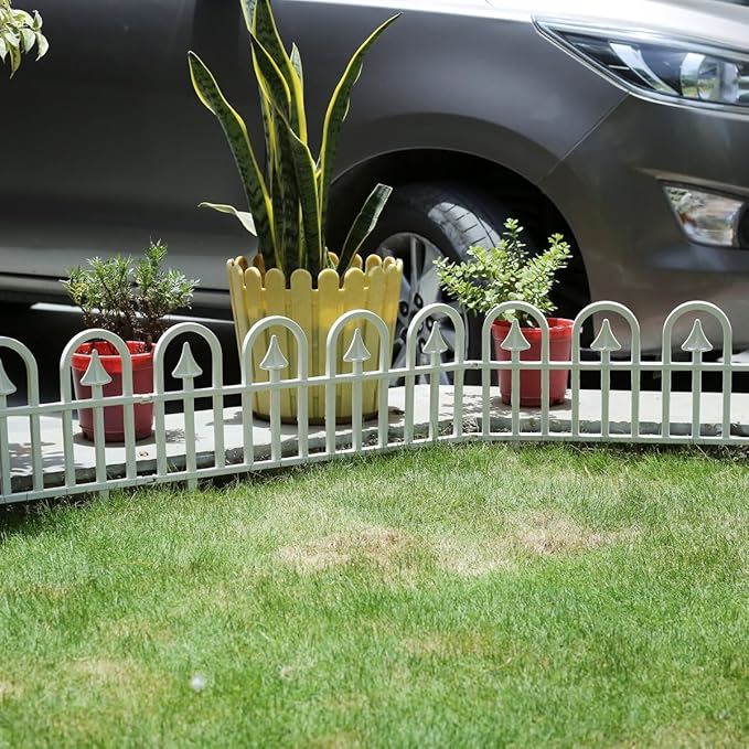 White garden fence with potted plants, ideal for home & garden decor