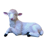 White sheep figurine on a white background