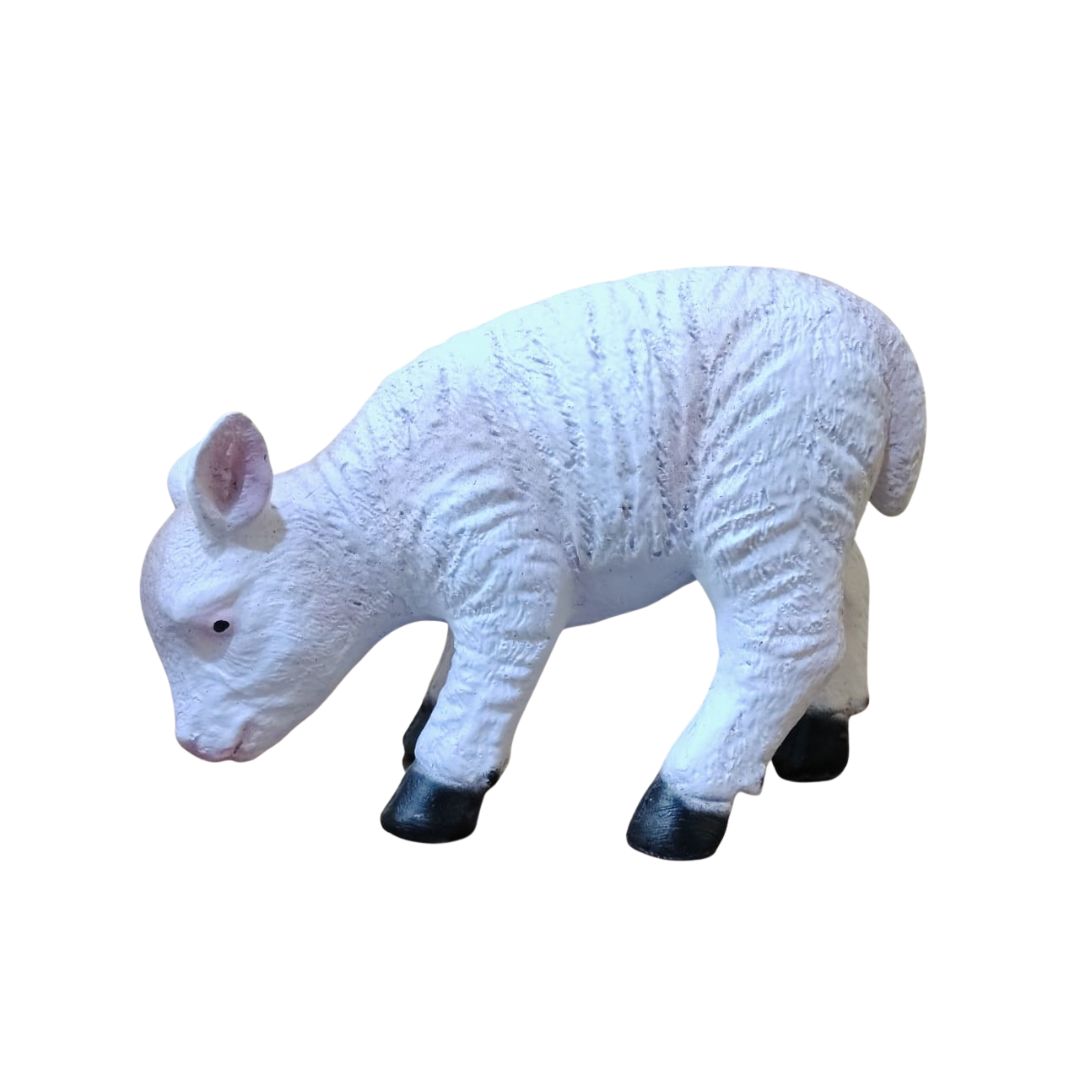 White lamb figurine on a white background