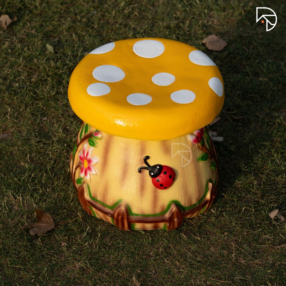 Mushroom-shaped garden stool placed on a patio — used as outdoor seating and decorative accent by The Decorshed
