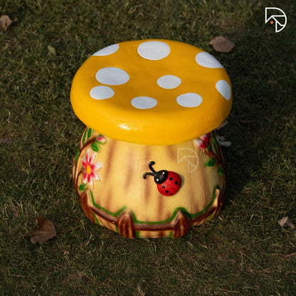 Mushroom-shaped garden stool placed on a patio — used as outdoor seating and decorative accent by The Decorshed