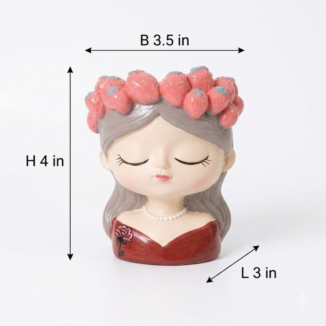 A small decorative figurine of a sleeping girl with a pink floral crown, gray hair, and a red dress, shown on a white background with dimension labels indicating B 3.5 in, H 4 in, and L 3 in.