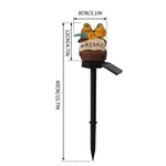Solar garden stake light with two colorful bird figurines and welcome sign, product dimensions shown.