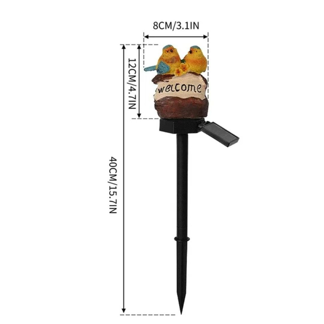 Solar garden stake light with two colorful bird figurines and welcome sign, product dimensions shown.