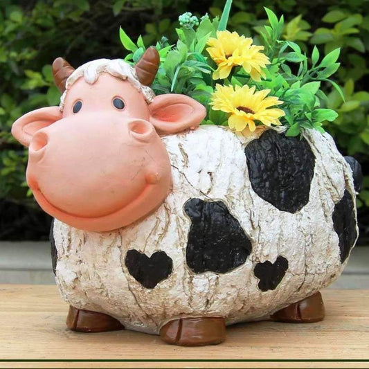 Elegant Kamadhenu cow and calf statue planter made of high-quality polyresin, ideal for indoor and outdoor home decor.