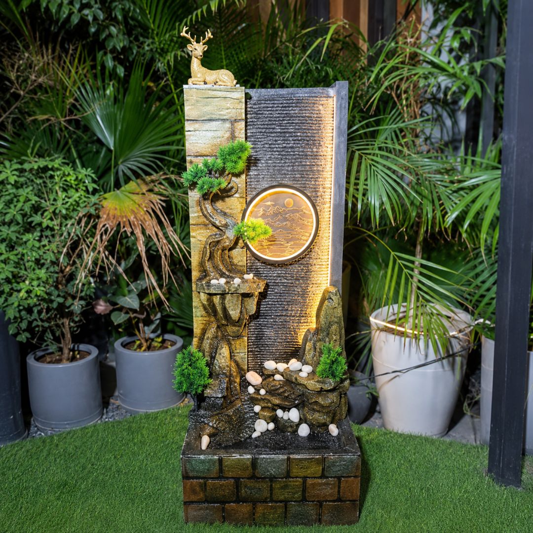 Decorative water fountain with animal sculptures in a garden setting