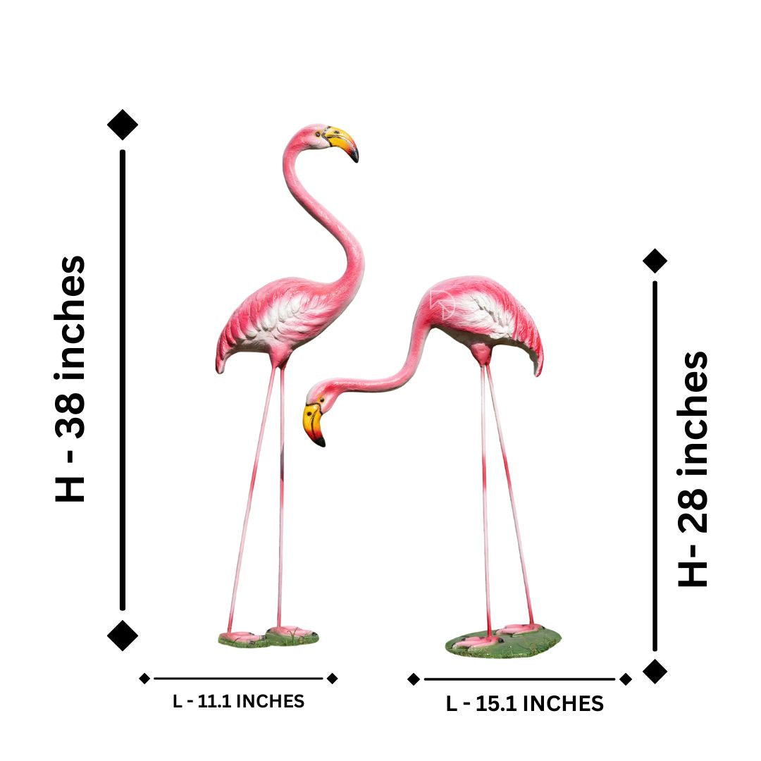 Two pink flamingo statues with measurements on a white background