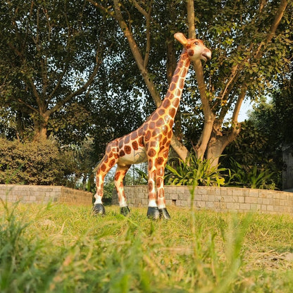 Modern giraffe statue for jungle theme birthday decorations, crafted from premium polyresin.