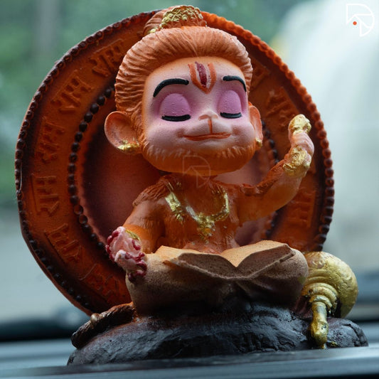 Terracotta figurine of a monkey deity with a blurred background