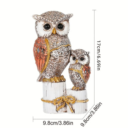Decorative owl figurine set with ornate details, orange accents, and size measurements shown